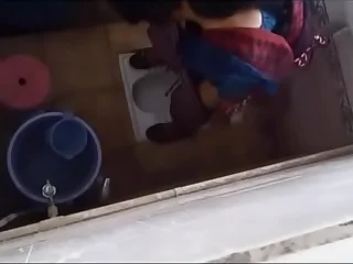 Desi college girl pissing caught in bathroom hidden camera